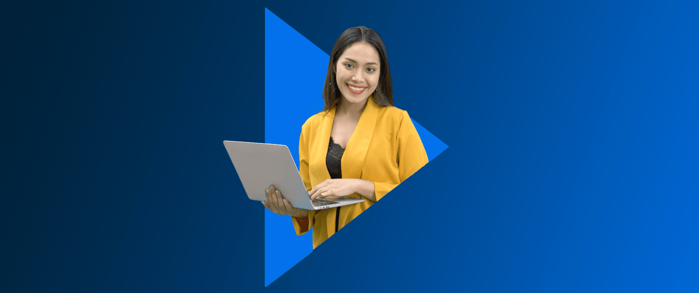 smiling lady holding laptop